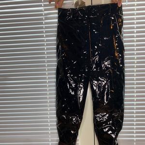 Black vinyl skinny pants